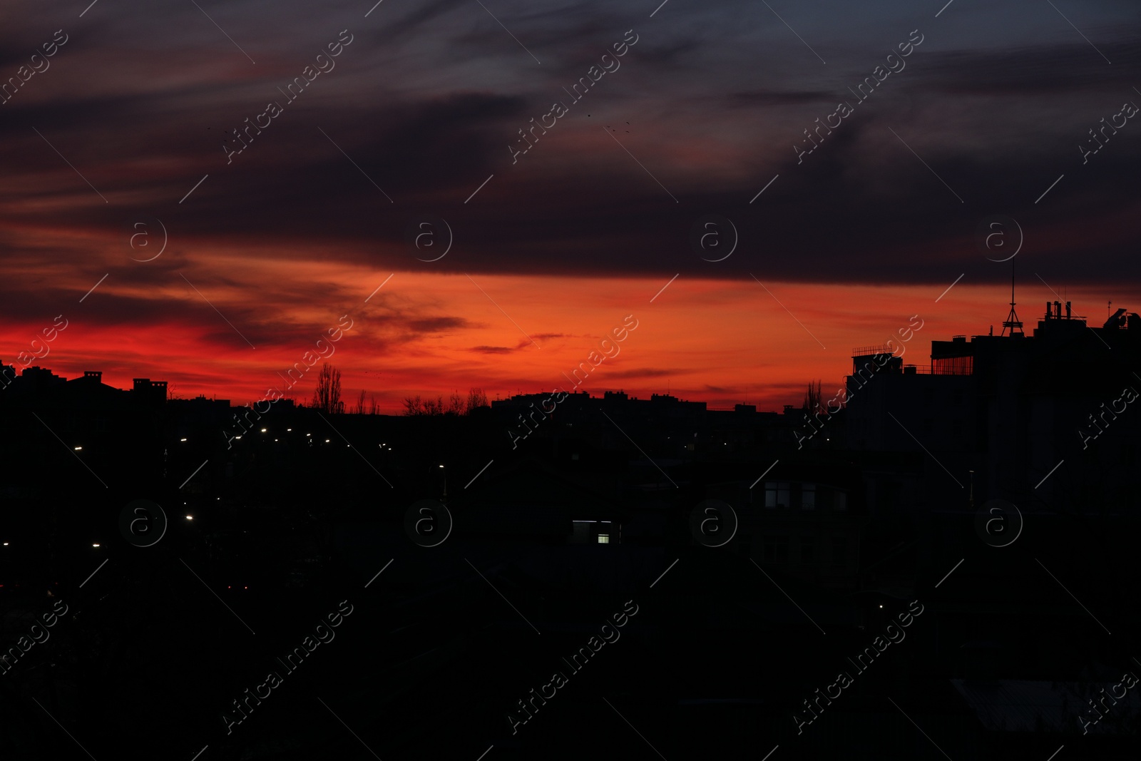 Photo of View of beautiful sky over city at sunset