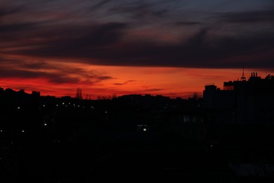 Photo of View of beautiful sky over city at sunset