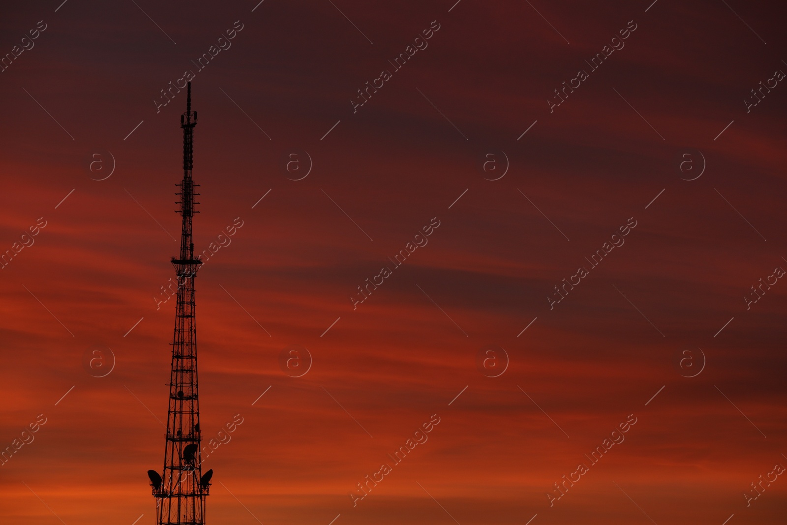 Photo of Transmission tower against beautiful sky at sunset