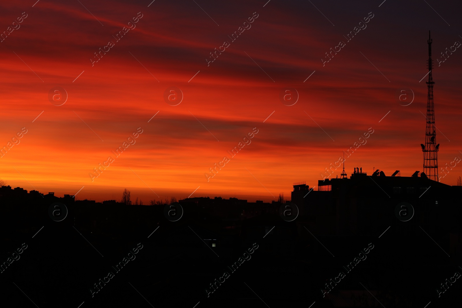 Photo of Picturesque view of city under beautiful sky at sunset