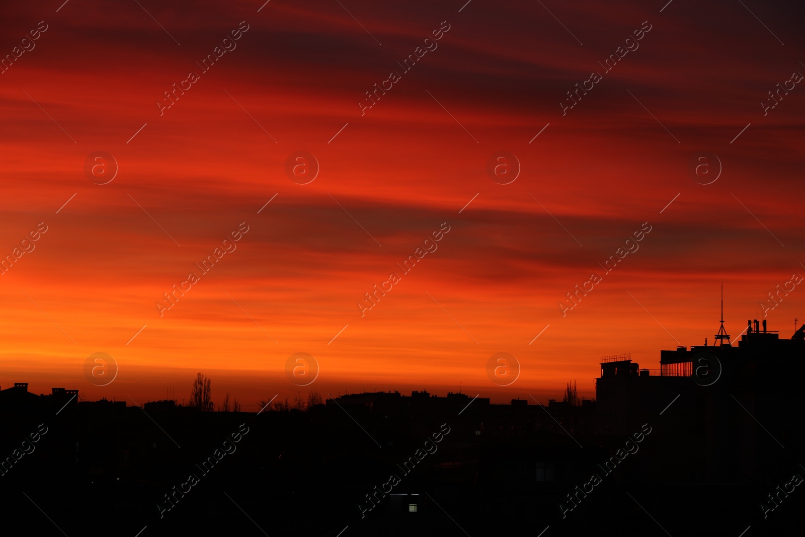 Photo of Picturesque view of city under beautiful sky at sunset