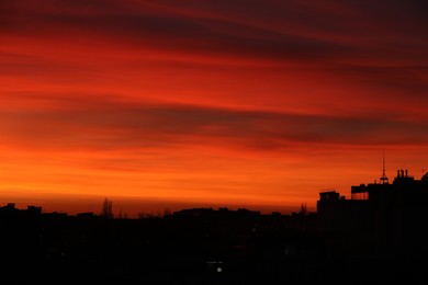 Photo of Picturesque view of city under beautiful sky at sunset