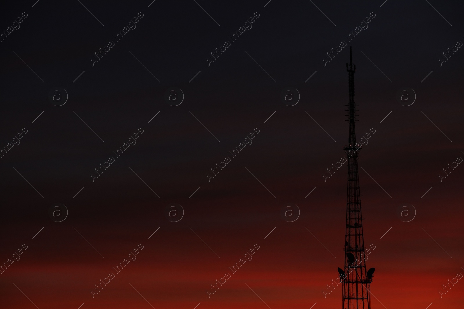 Photo of Transmission tower against beautiful sky at sunset