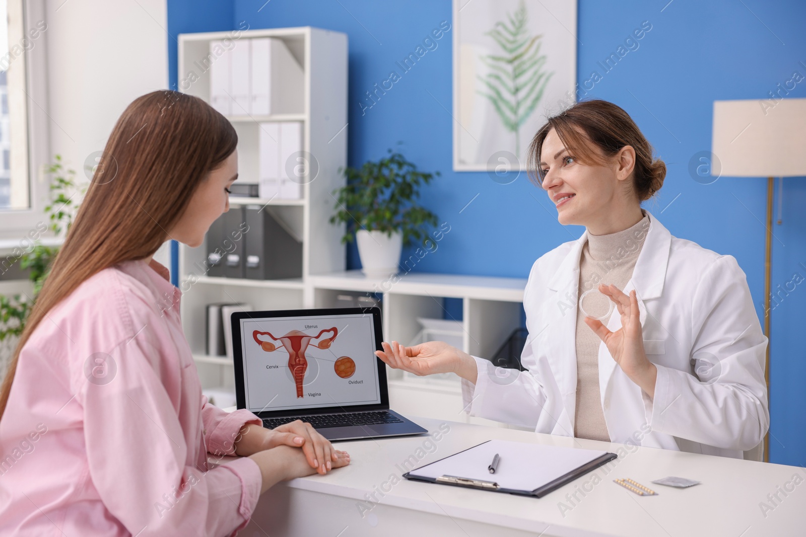 Photo of Contraception. Gynecologist recommending vaginal ring to woman in clinic