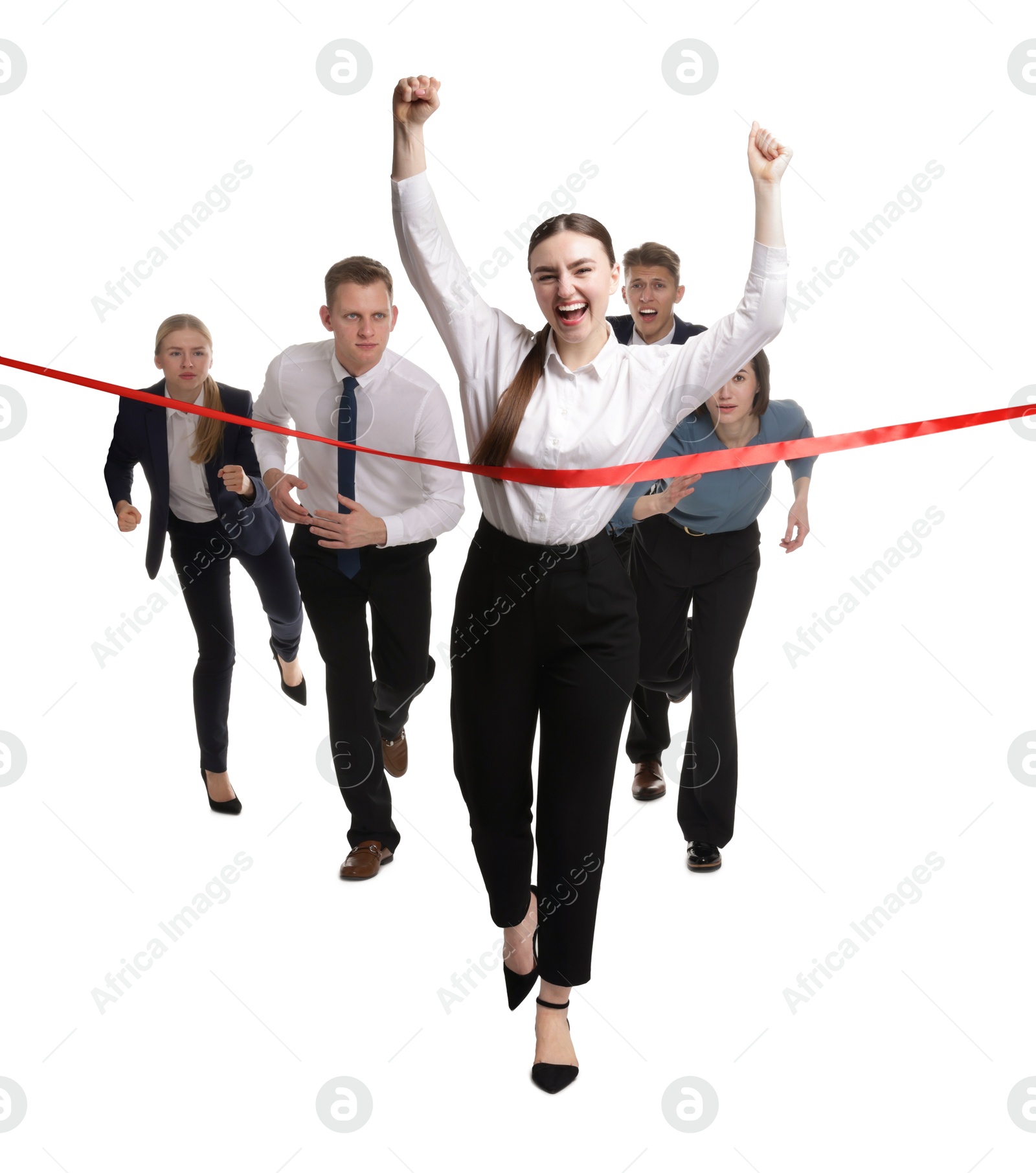 Photo of Competition concept. Happy businesswoman crossing red finish line ahead of her colleagues on white background