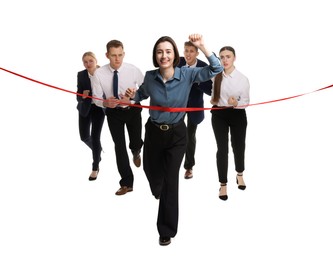 Competition concept. Happy businesswoman crossing red finish line ahead of her colleagues on white background