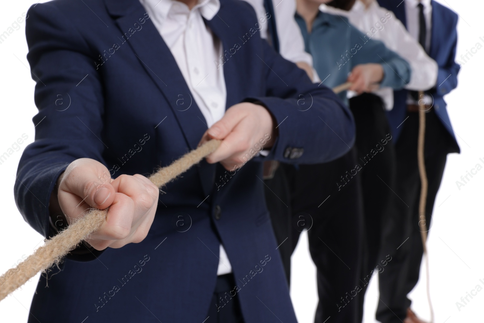 Photo of Competition concept. Businesspeople pulling rope on white background, closeup