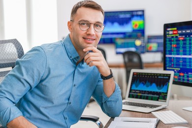 Portrait of financial trading specialist in office