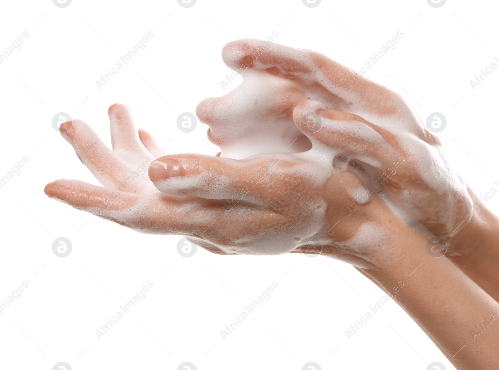 Photo of Woman washing hands with foaming soap on white background, closeup. Hygiene