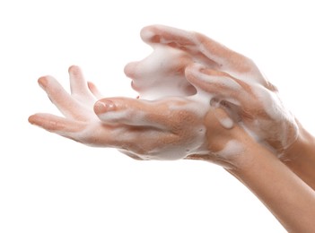 Photo of Woman washing hands with foaming soap on white background, closeup. Hygiene