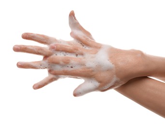 Photo of Woman washing hands with foaming soap on white background, closeup. Hygiene