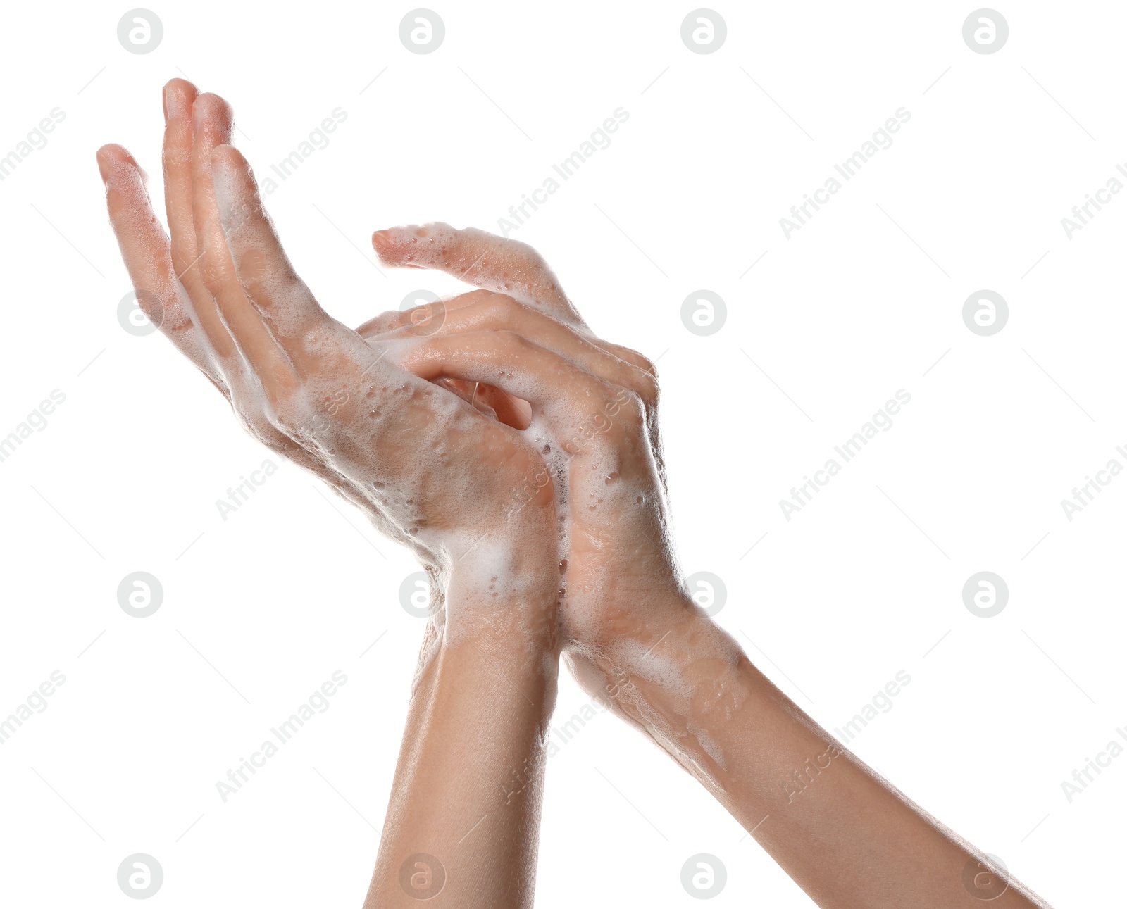 Photo of Woman washing hands with foaming soap on white background, closeup. Hygiene