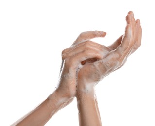 Photo of Woman washing hands with foaming soap on white background, closeup. Hygiene