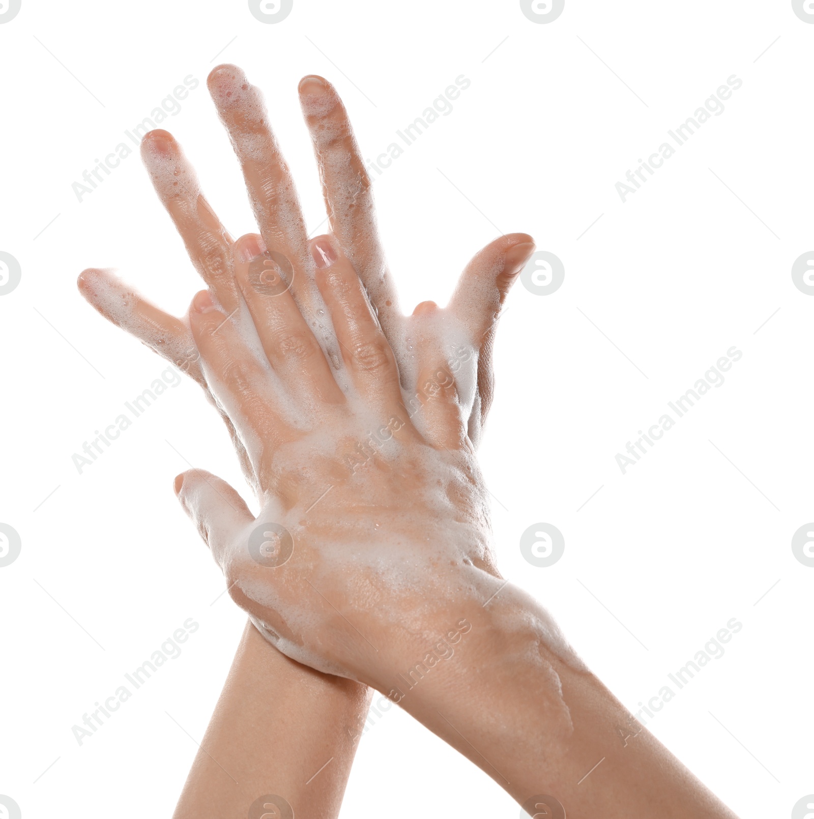 Photo of Woman washing hands with foaming soap on white background, closeup. Hygiene