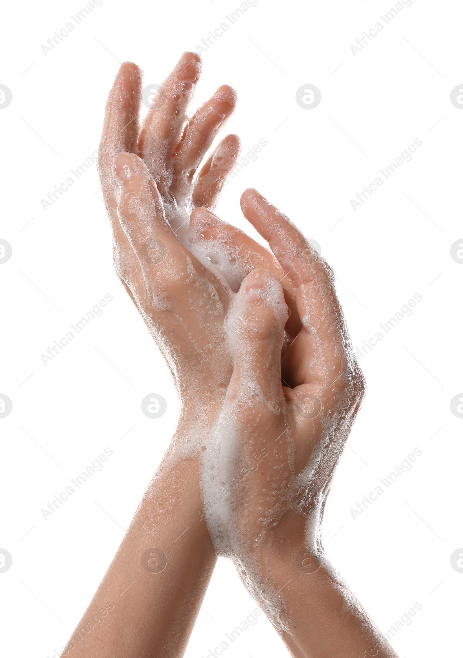 Photo of Woman washing hands with foaming soap on white background, closeup. Hygiene