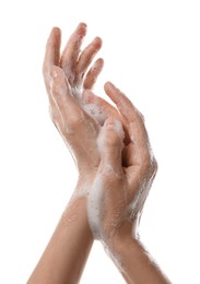 Photo of Woman washing hands with foaming soap on white background, closeup. Hygiene