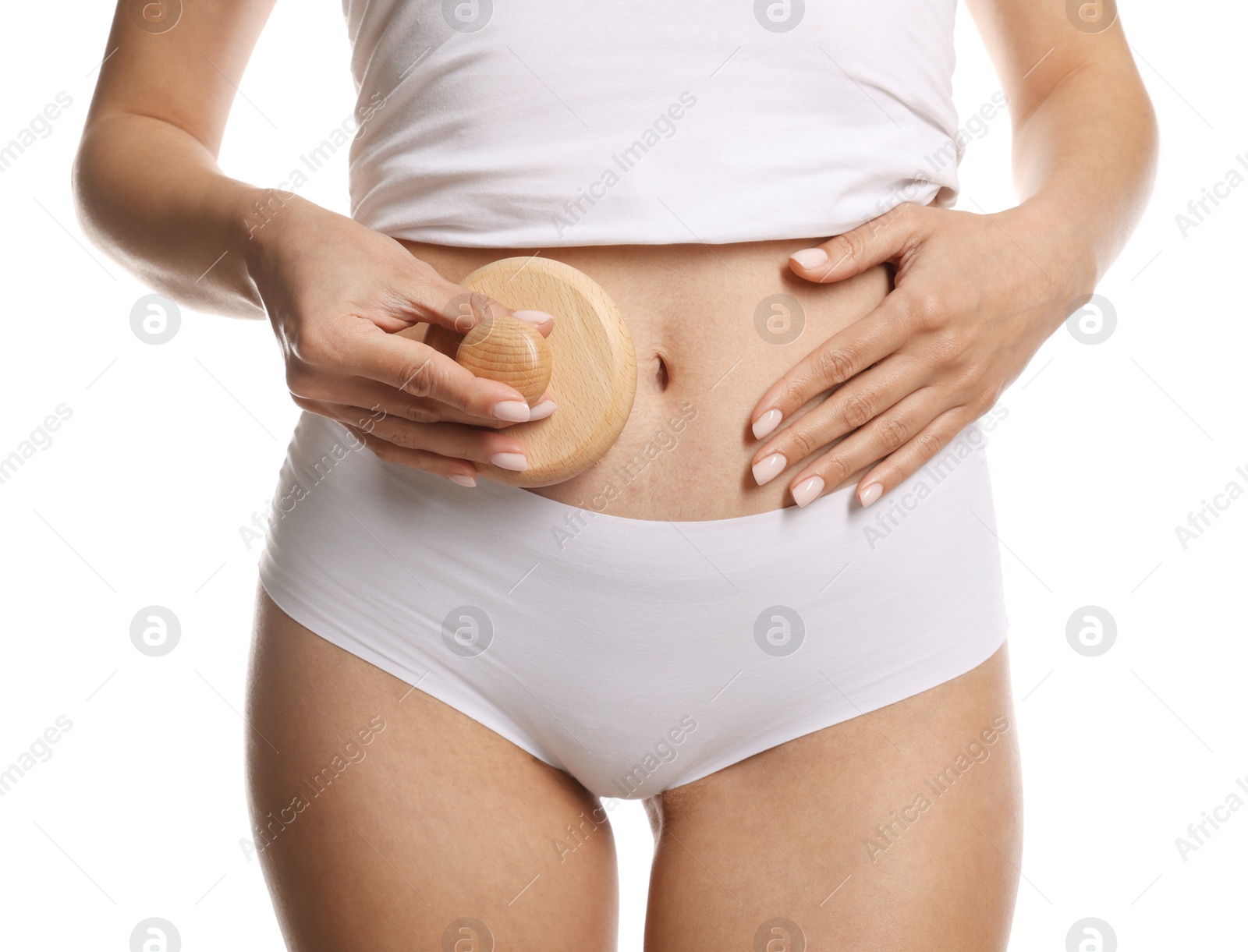 Photo of Woman doing anti cellulite massage with brush on white background, closeup