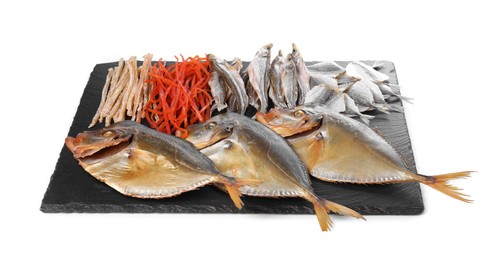 Many different dried fish snacks isolated on white