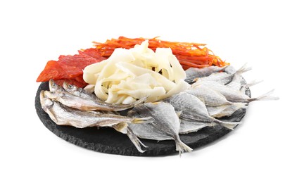 Many different dried fish snacks isolated on white