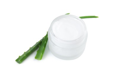 Photo of Moisturizing cream with extract of aloe vera in jar and cut leaves isolated on white