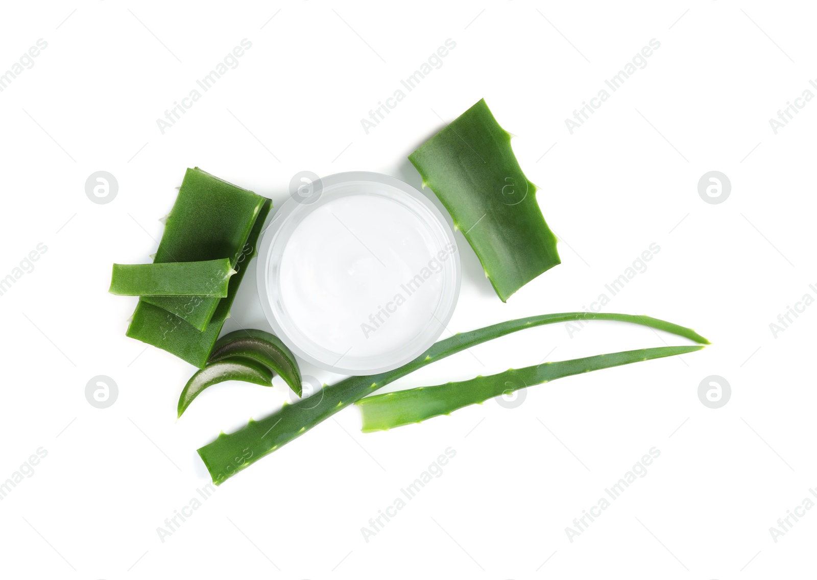 Photo of Moisturizing cream with extract of aloe vera in jar and cut leaves isolated on white, top view