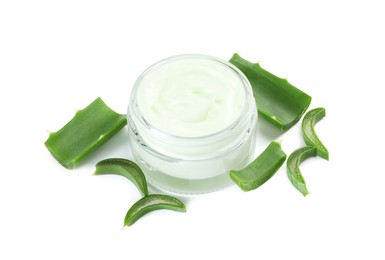 Moisturizing cream with extract of aloe vera in jar and cut leaves isolated on white