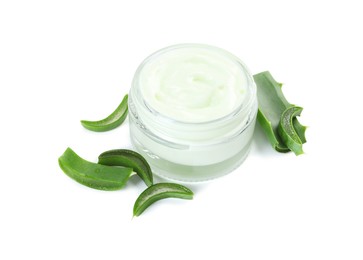 Moisturizing cream with extract of aloe vera in jar and cut leaves isolated on white