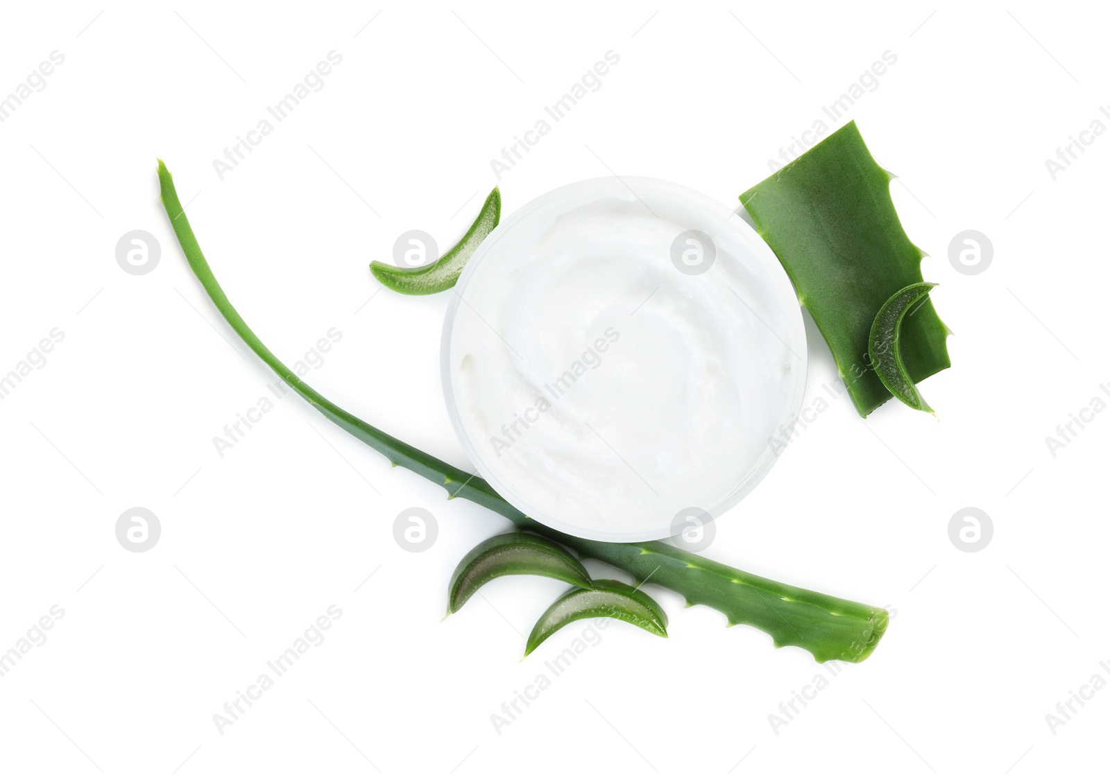 Photo of Moisturizing cream with extract of aloe vera in jar and cut leaves isolated on white, top view