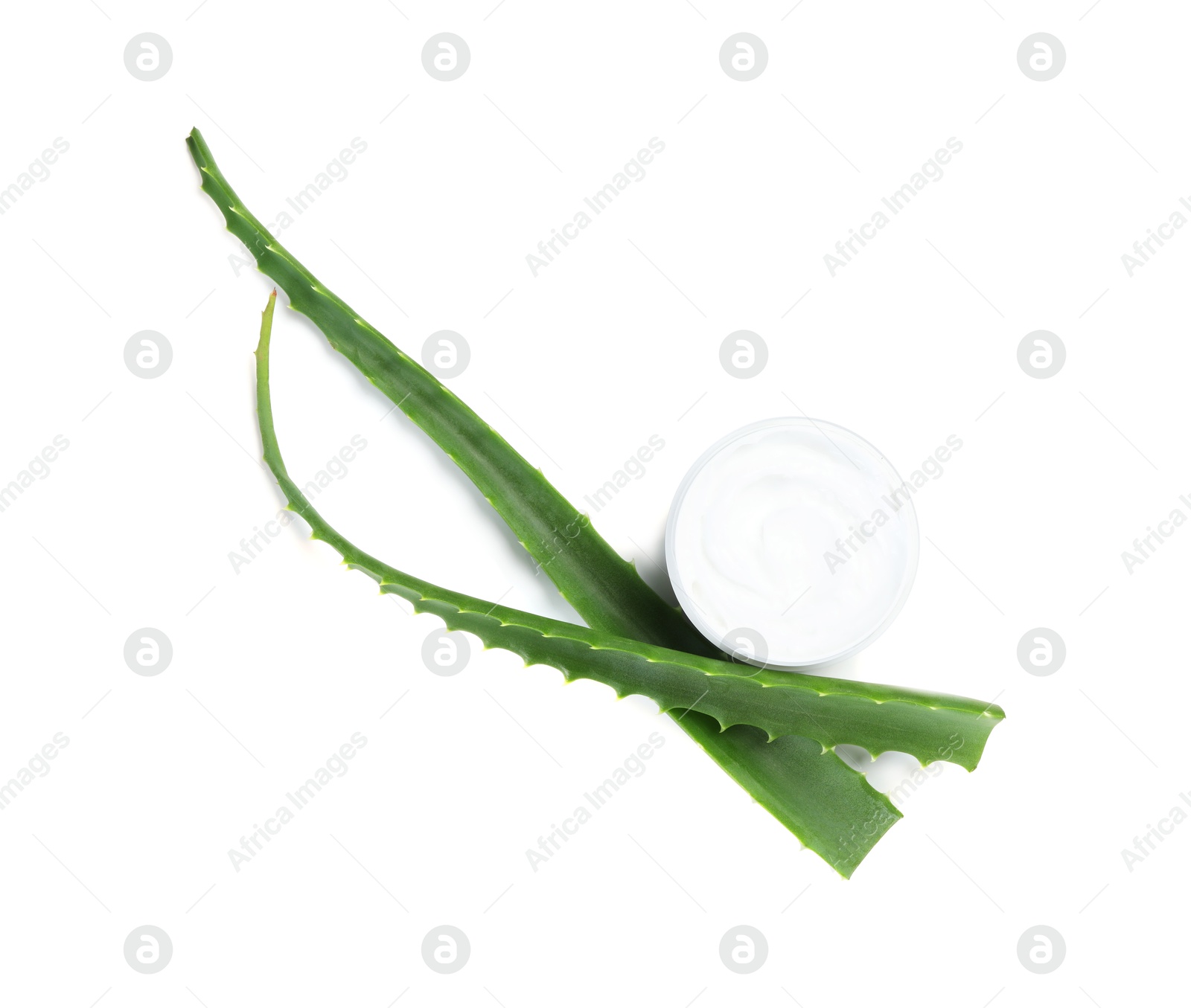 Photo of Moisturizing cream with extract of aloe vera in jar and cut leaves isolated on white, top view