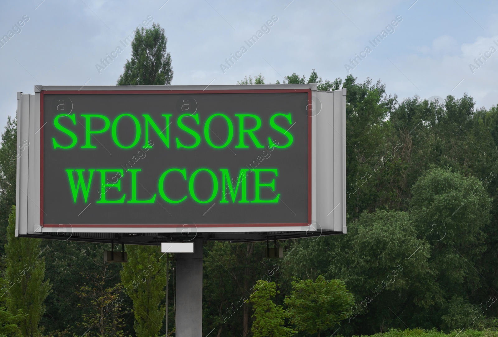 Image of Advertising board with text Sponsors Welcome outdoors