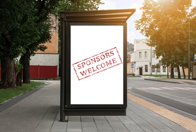 Image of Advertising board with text Sponsors Welcome on bus stop