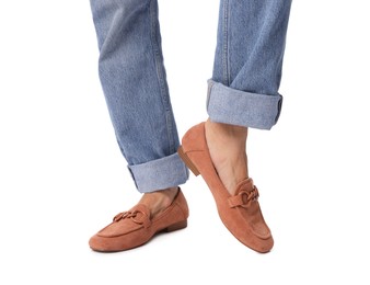 Photo of Woman wearing stylish slip-on shoes on white background, closeup