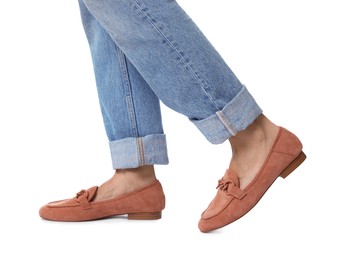 Photo of Woman wearing stylish slip-on shoes on white background, closeup