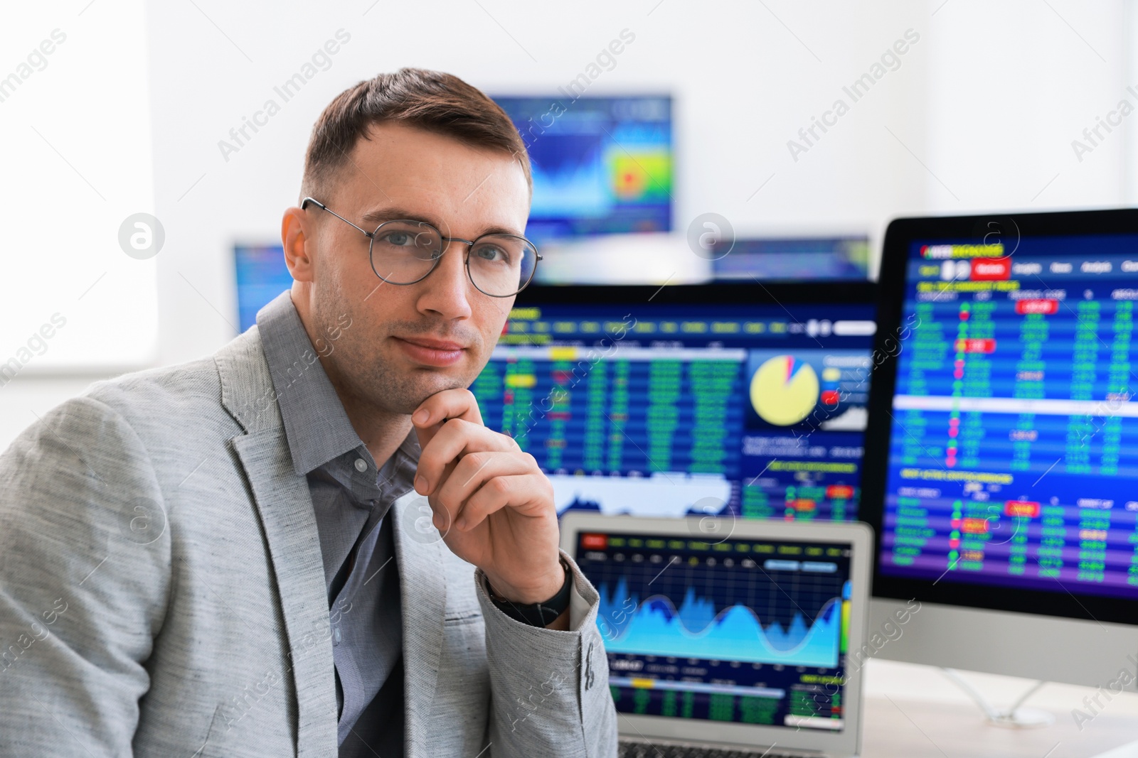 Photo of Portrait of financial trading specialist in office