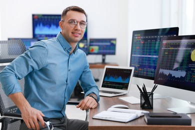 Photo of Portrait of financial trading specialist in office