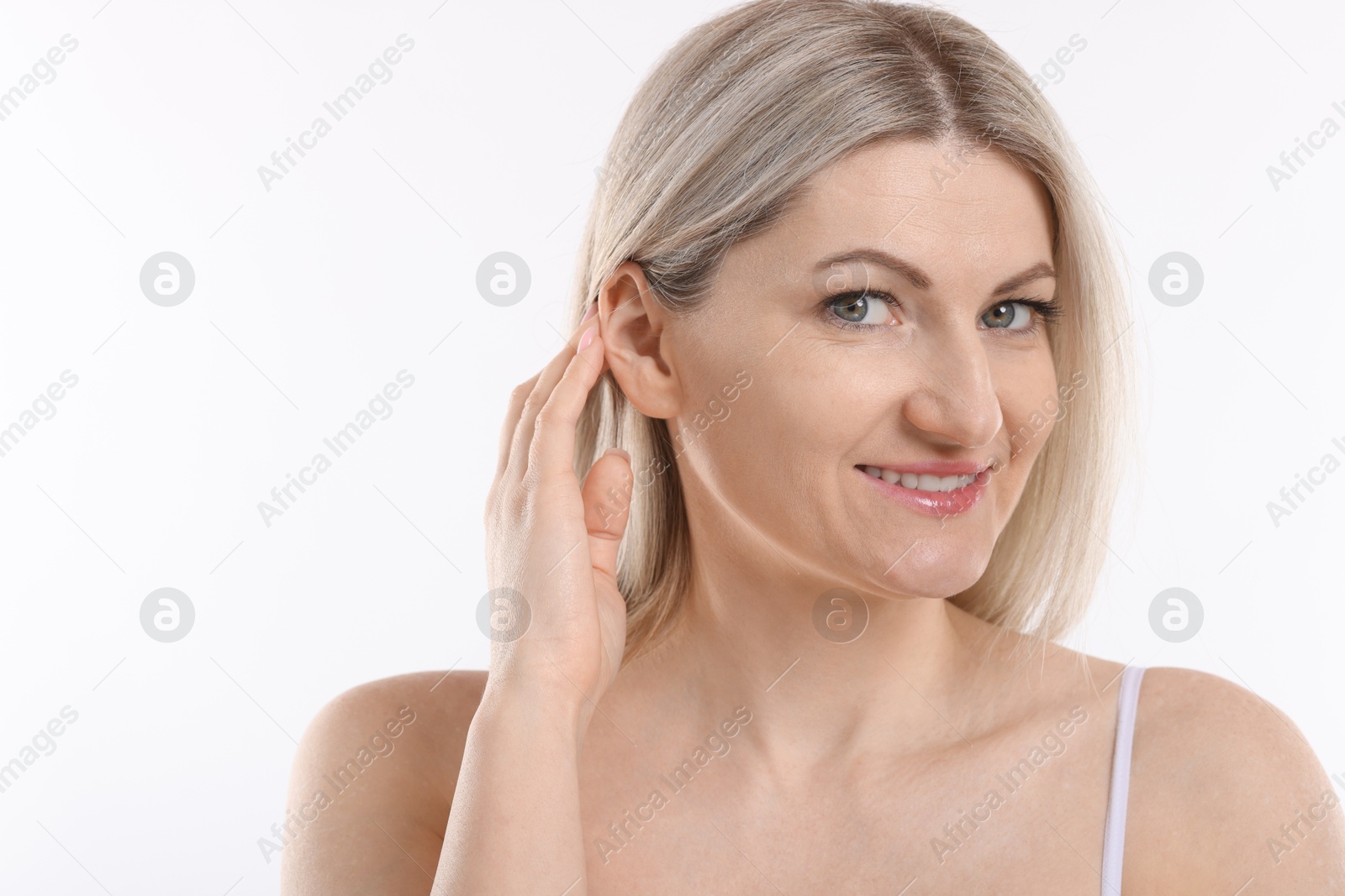 Photo of Portrait of beautiful woman on white background