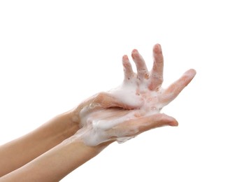 Photo of Woman washing hands with foaming soap on white background, closeup. Hygiene