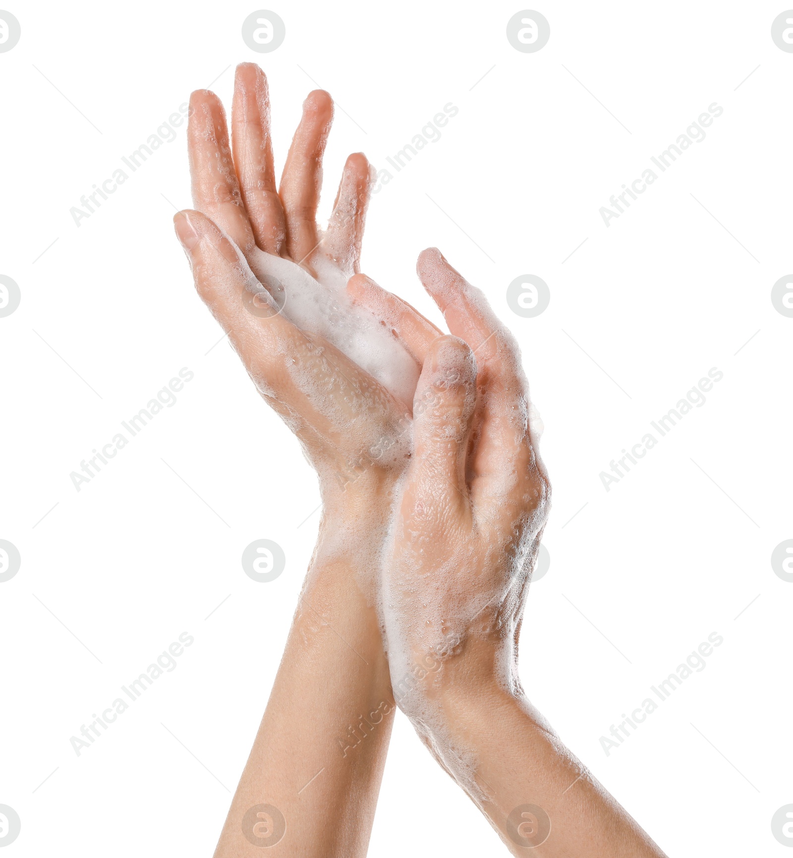 Photo of Woman washing hands with foaming soap on white background, closeup. Hygiene