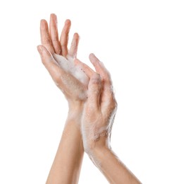 Photo of Woman washing hands with foaming soap on white background, closeup. Hygiene