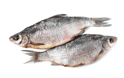 Dried salted roach fish isolated on white, top view