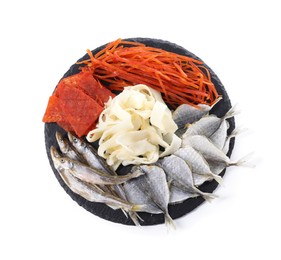 Many different dried fish snacks isolated on white, top view