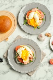 Photo of Flat lay composition with tasty brunch served on white marble table