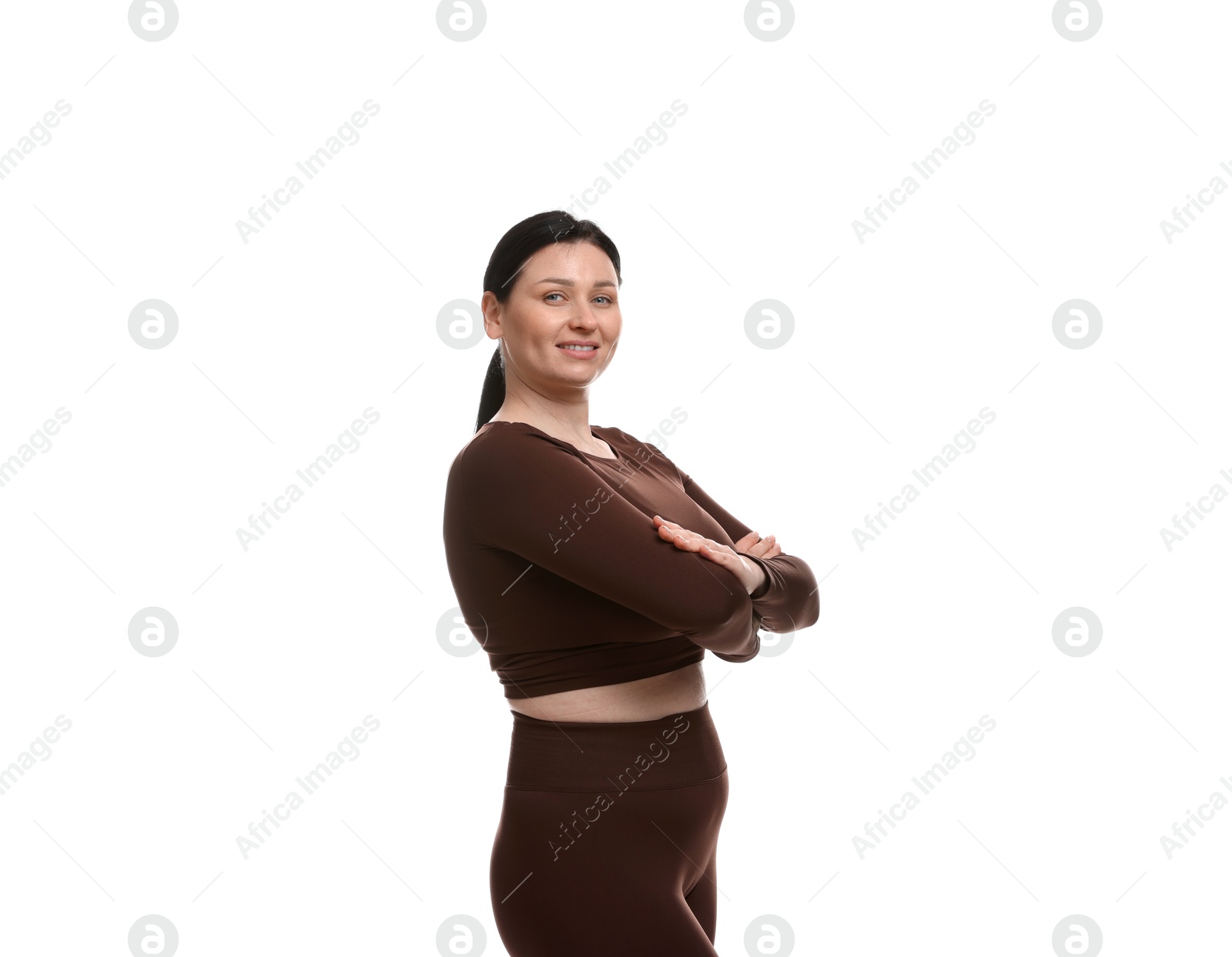 Photo of Plus size woman in gym clothes on white background