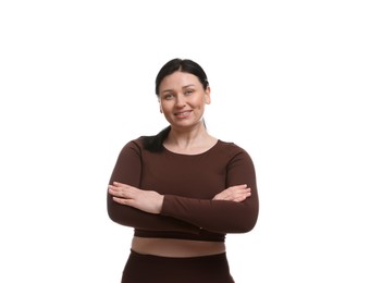 Plus size woman in gym clothes on white background