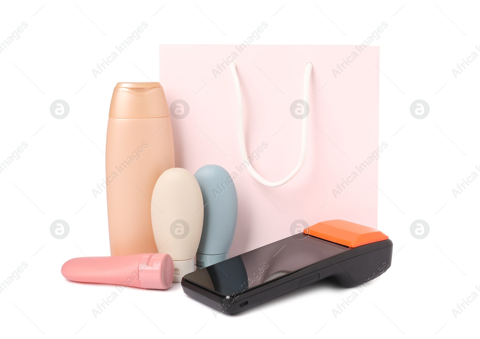 Photo of Payment terminal, shopping bag and cosmetic products isolated on white