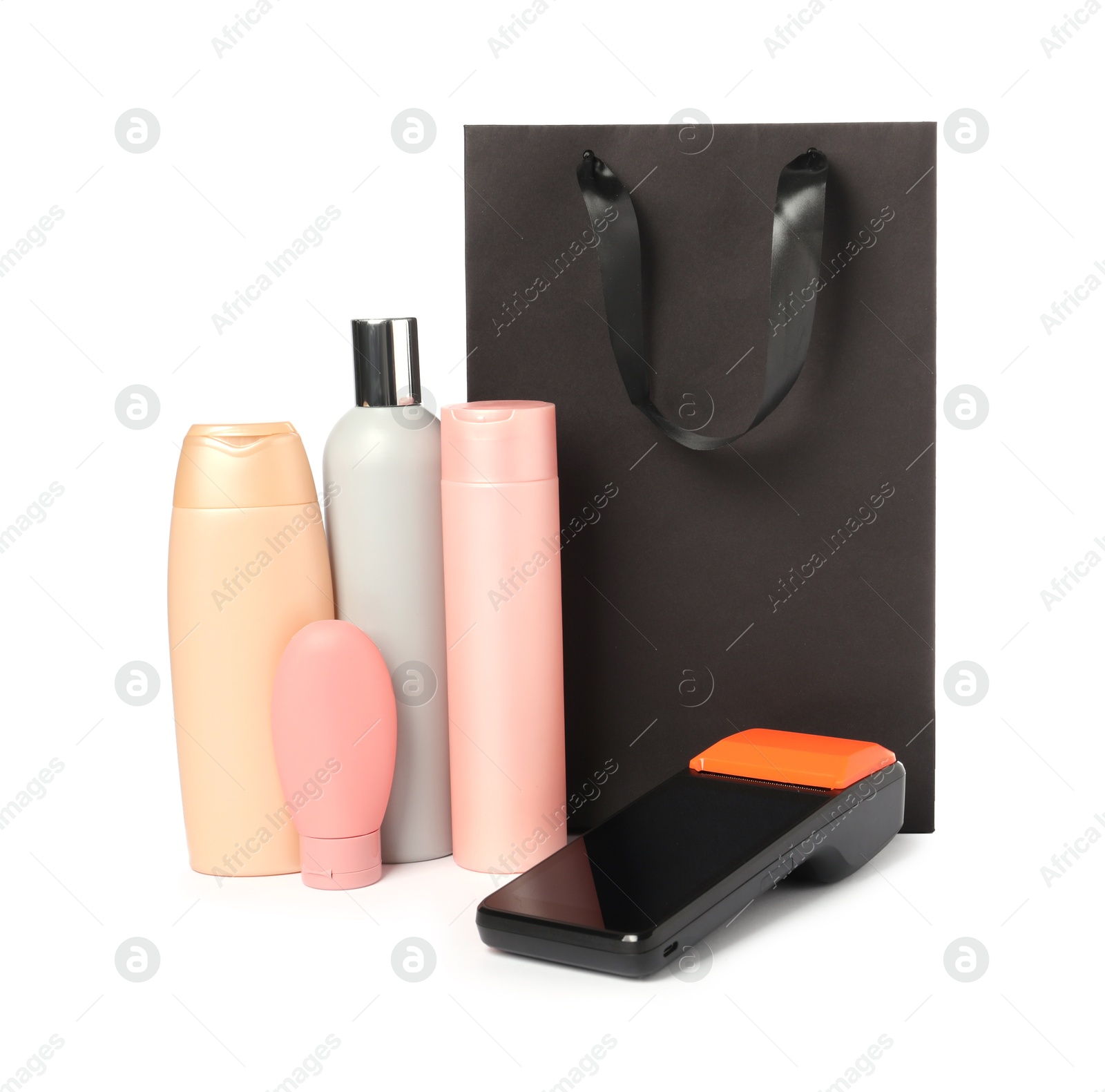 Photo of Payment terminal, shopping bag and cosmetic products isolated on white