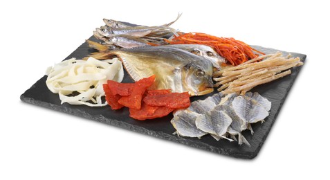 Many different dried fish snacks isolated on white