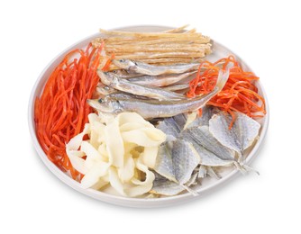 Many different dried fish snacks isolated on white