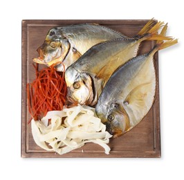 Photo of Many different dried fish snacks isolated on white, top view