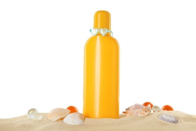 Photo of Bottle of sun protection product, decorative stones and seashells on sand against white background